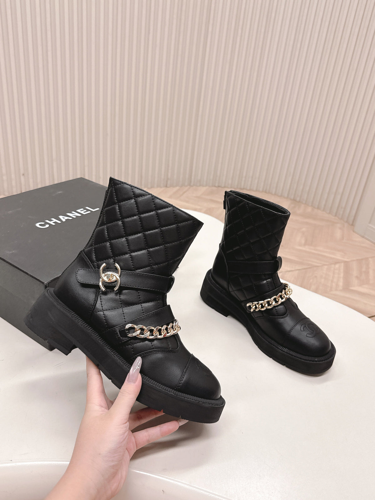 CHANEL ANKLE BOOTS 25S IN BLACK LAMBSKIN EMBOSSED LOGO WITH GOLD HARDWARE